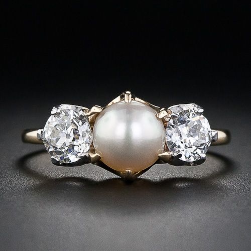 antique wedding ring with medium sized pearls
