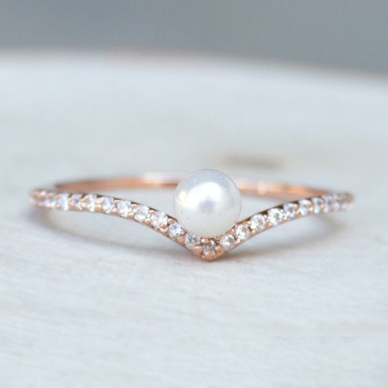 pearl engagement ring with tiny diamonds