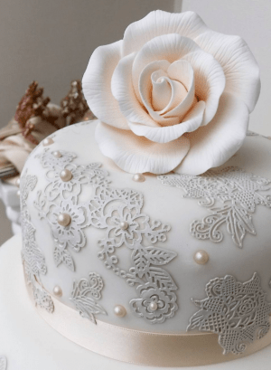 Lexica - 7 tier golden wedding cake with roses