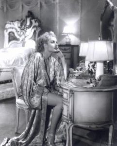 old hollywood astar in silk robe